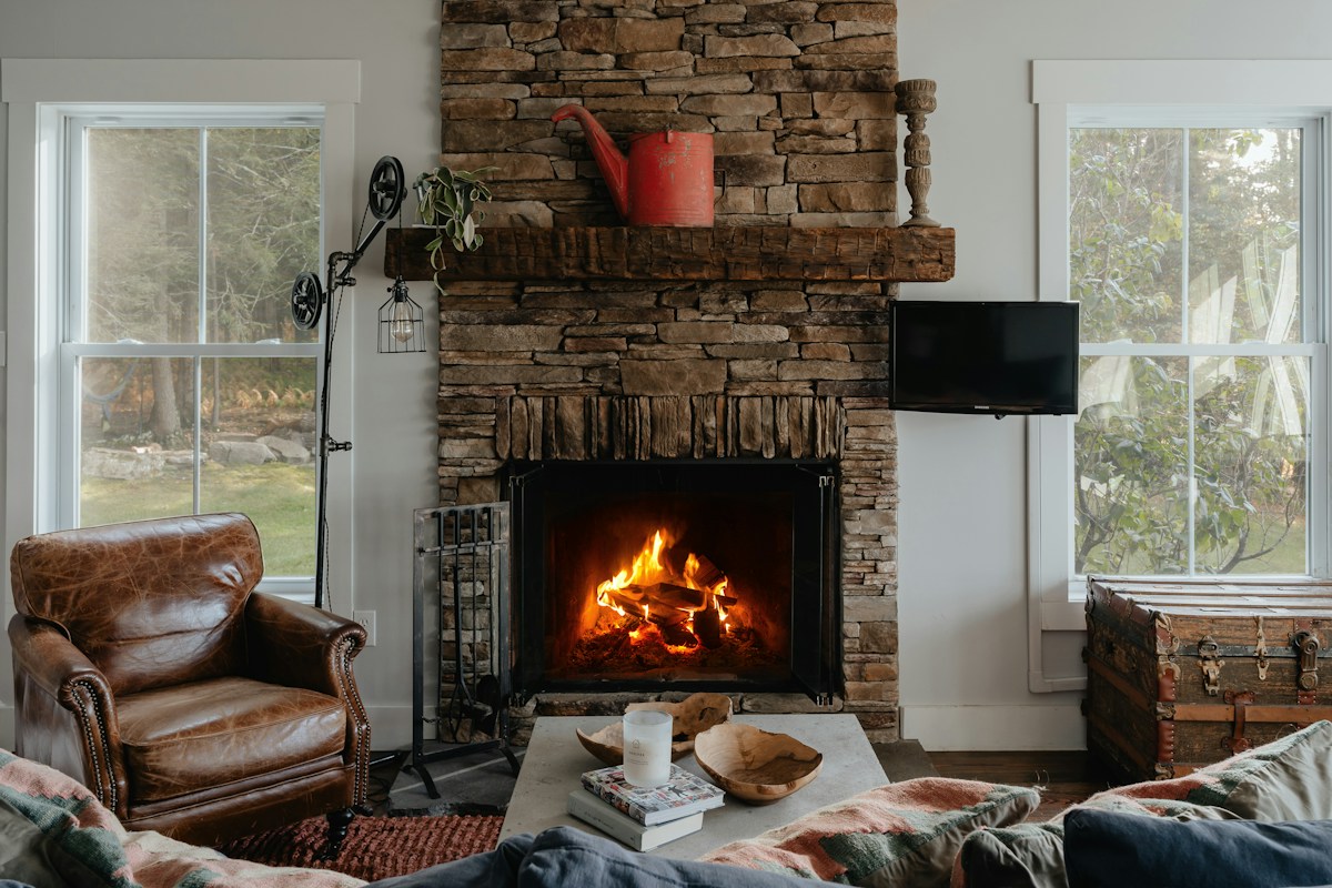 Comfortable furnished living room with a fireplace